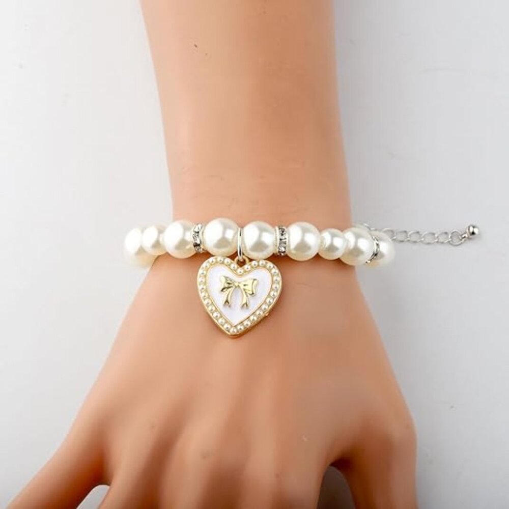 Neiman Marcus Coquette White Heart Golden Bow Bracelet